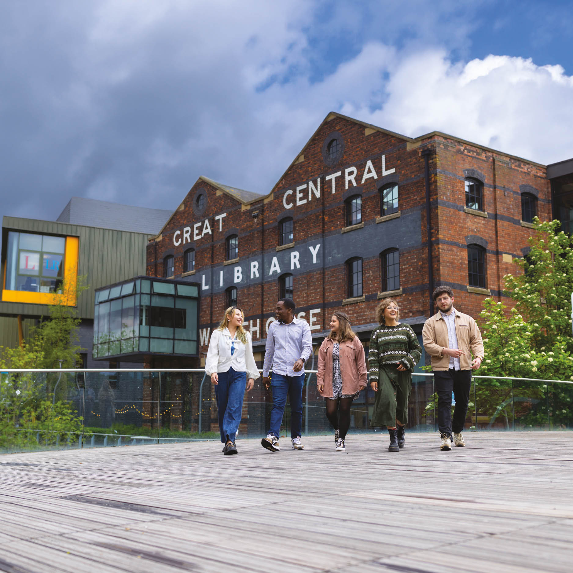 Students walking past the University of Lincoln library