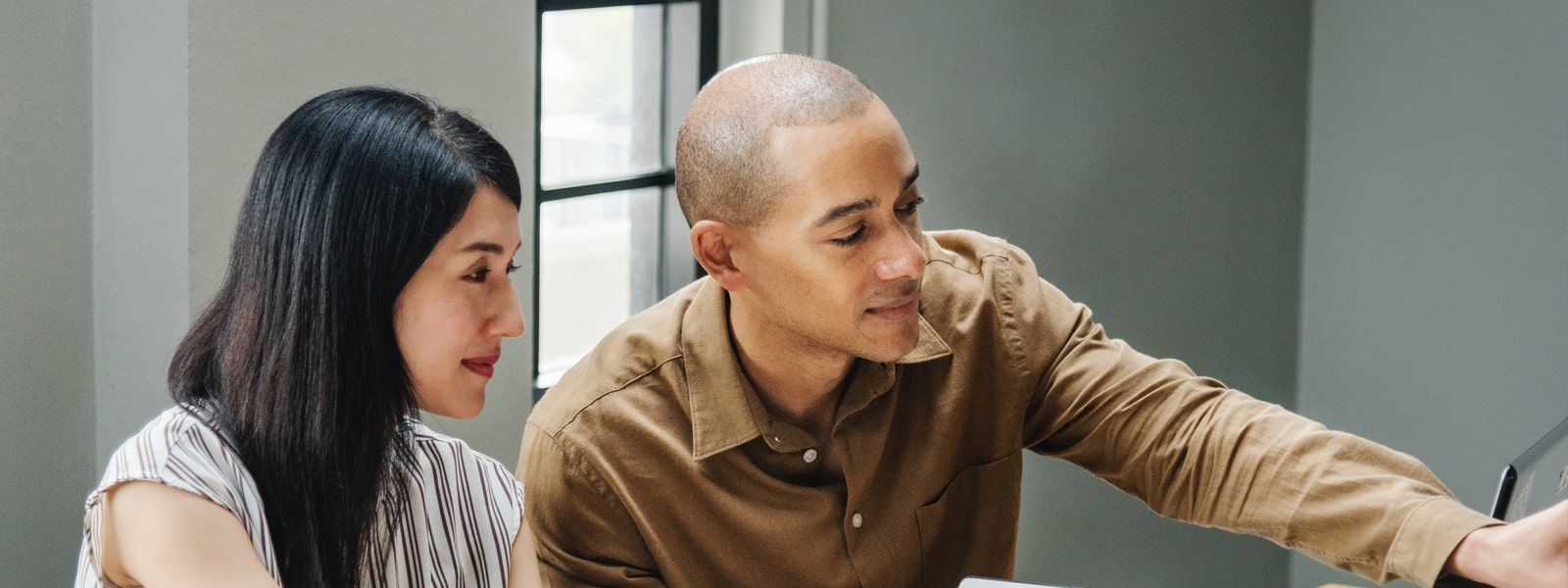 Two colleagues working in an office