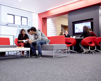 Students sitting talking in a group