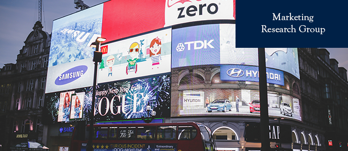 A busy street with billboards and advertisements