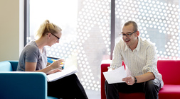 Students sitting in a communal study space