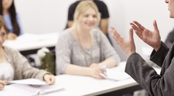 Teachers sitting in a conference hall