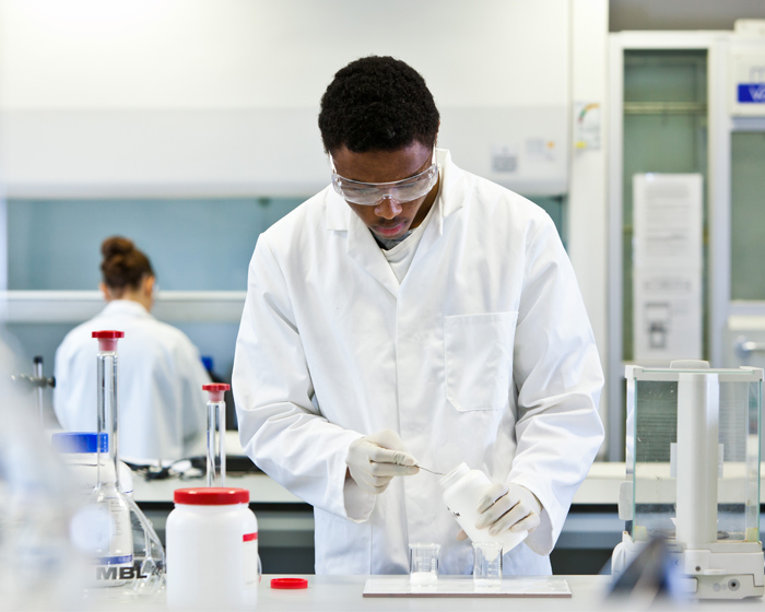 Student conducting experiments in a laboratory