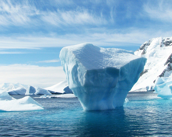 An iceberg floating in the ocean