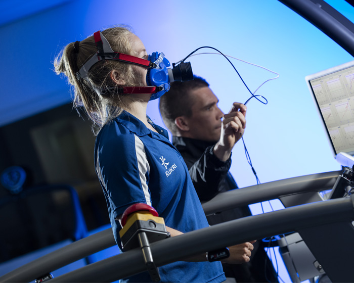 A student testing exercise equipment