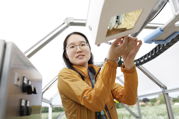 A student working with agri-tech equipment