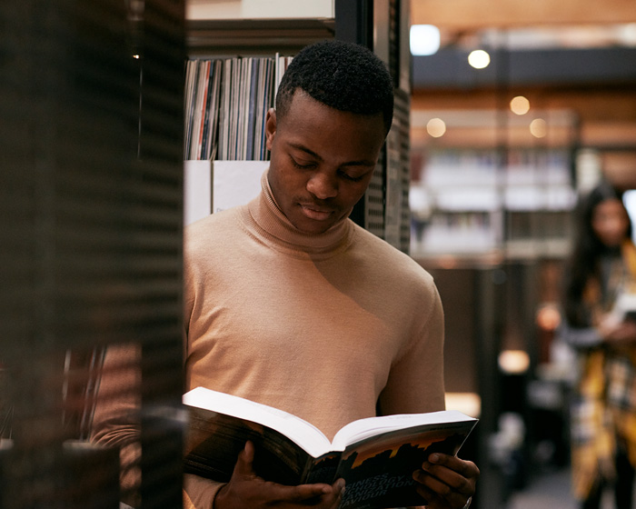 A student reading a book