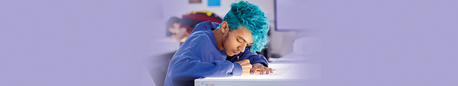 Image of student working at a light box