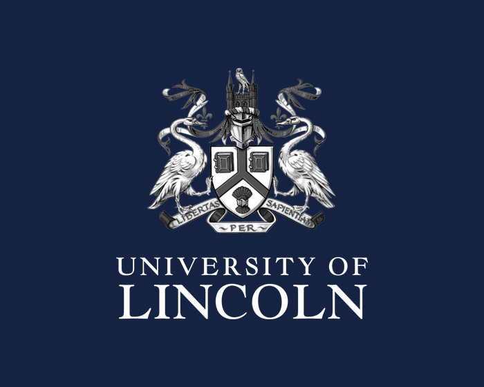White University of Lincoln crest with navy background